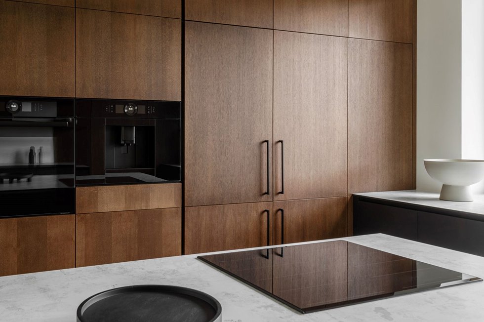 Wooden kitchen cabinet with high-tech kitchen appliances